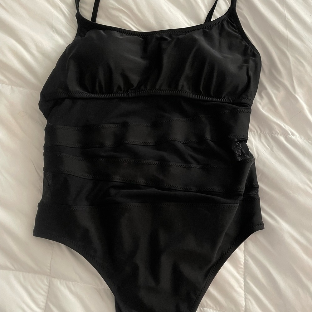 XL Black bathing suit. Purchased from target for $40. Very flattering.